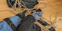 A few ropes tossed around a messy floor